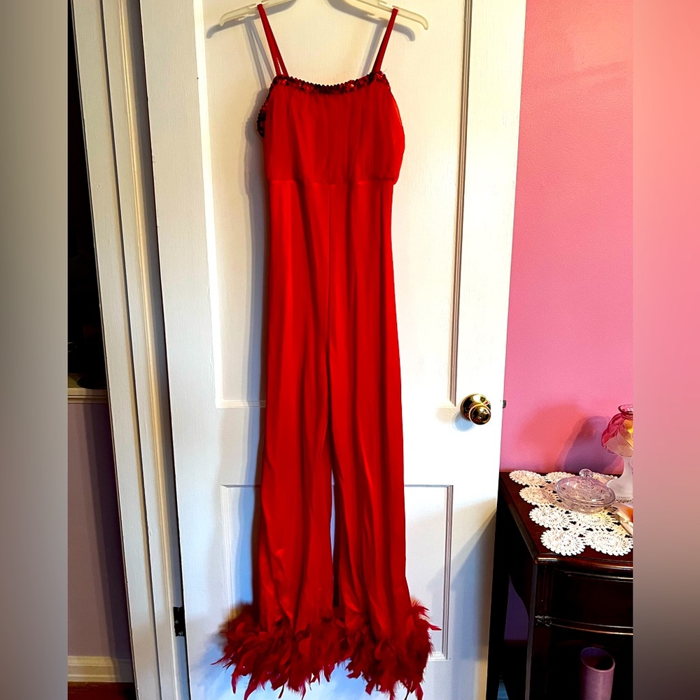 Fun red spandex & feather unitard w/ sequin trim